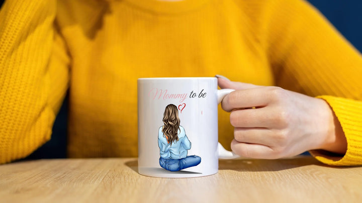 woman-sweater-holding-cup-wooden-table